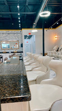 Load image into Gallery viewer, customer chair at nail salon manicure table